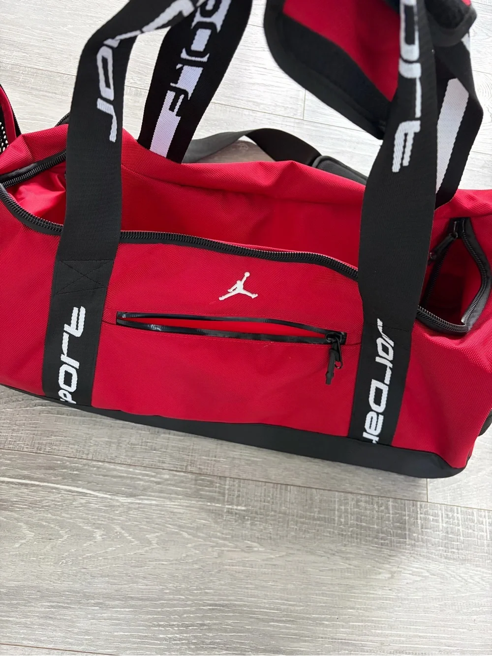 Jordan Red Duffel Bag with Black Straps